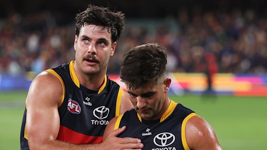 Crows Darcy Fogarty and Josh Rachele (right) after the loss to Essendon.