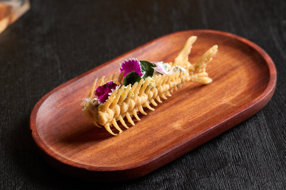 Fish crisp with ricotta and tarama, white sardines, house-made preserved lemon gel and oregano.