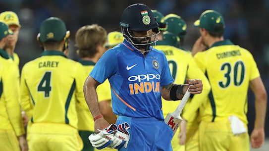 HYDERABAD, INDIA - MARCH 02: Virat Kohli of India is dismissed by Adam Zampa of Australia during game one of the One Day International series between India and Australia at Rajiv Gandhi International Cricket Stadium on March 02, 2019 in Hyderabad, India. (Photo by Robert Cianflone/Getty Images) India v Australia - ODI Series: Game 1HYDERABAD, INDIA - MARCH 02: Virat Kohli of India is dismissed by Adam Zampa of Australia during game one of the One Day International series between India and Australia at Rajiv Gandhi International Cricket Stadium on March 02, 2019 in Hyderabad, India. (Photo by Robert Cianflone/Getty Images)