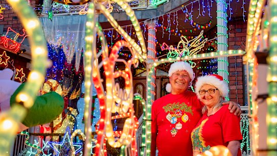 Tony & Mathilde Filippini out the front of their brightly lit home in Thomastown.