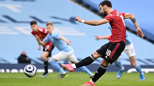 Bruno Fernandes scores for Manchester United against Manchester City.