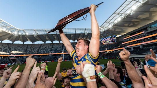 Sydney University' Guy Porter celebrates after winning back-to-back Shute Shield titles. 