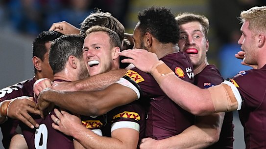 The Maroons celebrate.