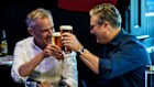 Not afraid. Canadian Prime Minister Mark Carney and British Prime Minister Keir Starmer raise a glass while watching Edmonton and Florida play an ice hockey match in a bar in Edmonton.