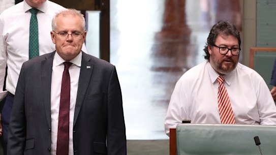 Prime Minister Scott Morrison and Nationals MP George Christensen pictured in Parliament last year.