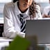 Stock image of a school student using a laptop
