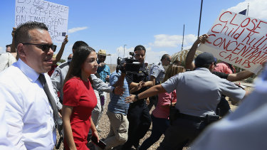 Ocasio-Cortez was escorted back to her vehicle after she spoke at the facility. 