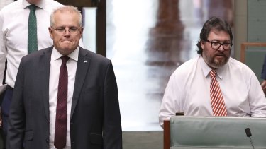Prime Minister Scott Morrison and Nationals MP George Christensen pictured in Parliament last year.