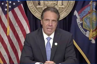 Governor Andrew Cuomo announces his resignation during a televised news conference.