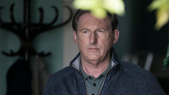 Adrian Dunbar plays Jim Hogan in Blood. 