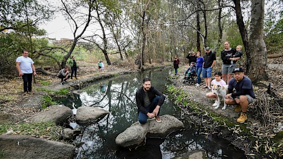 Darren Bennetts with fellow members of Friends of Stony Creek. They say their creek continues to be contaminated by industrial chemical spills.