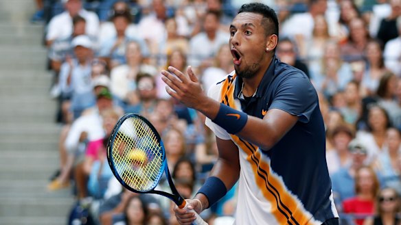 OMG: Nick Kyrgios reacts to Roger Federer's stunning passing shot during their third round clash at the US Open.