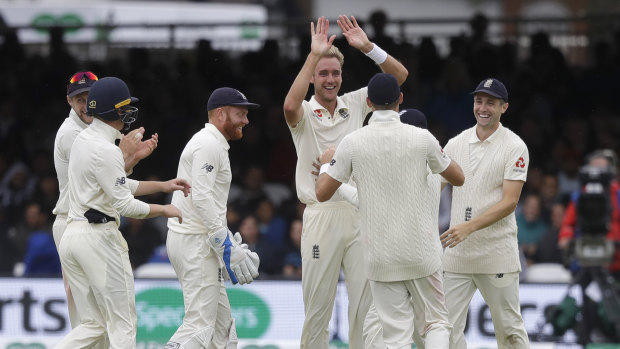 Grinners: Stuart Broad has helped bowl England to victory over India in the second Test at Lord's.