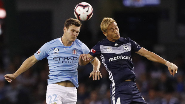 City's Curtis Good and Victory's Keisuke Honda go head to head ... but Kevin Muscat isn't thinking about a derby final yet. 
