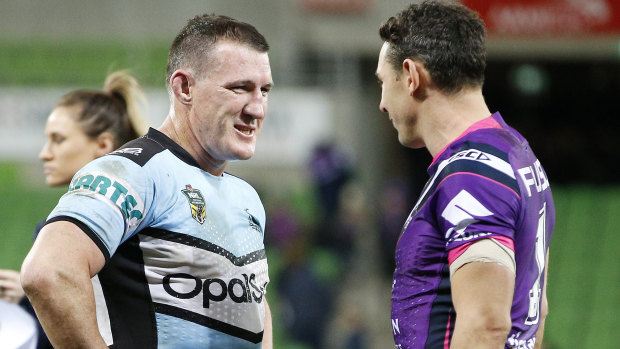 Golden oldies: Paul Gallen speaks with Billy Slater after the round 22 match between the Storm and the Sharks.