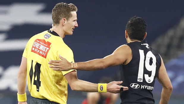 Arguing the toss: Eddie Betts speaks with the umpire during Carlton's win over Essendon.
