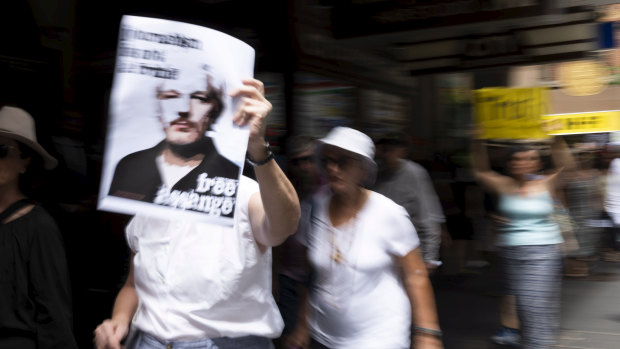 Protesters gather in support of Julian Assange at Martin Place, Sydney, Monday, February 24, 2020.