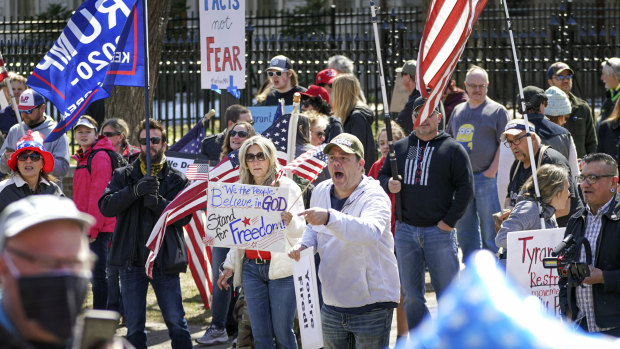 Hundreds of protesters gather outside Minnesota Gov. Tim Walz' official residence, 