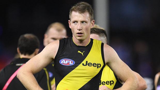 Nervous wait: the loss of defender Dylan Grimes would be a blow as Richmond aim for a top-two finish.