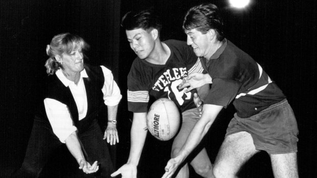 Australian pioneer: Marguerite Howard (nee Towers) passing on her knowledge to young Queensland players in 1990.
