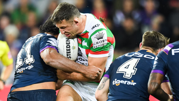 Shoulder to the wheel: Felise Kaufusi dislodges the ball from Sam Burgess.