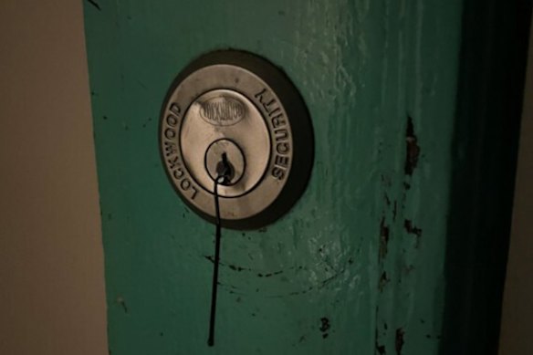 A police photo showing a bobby pin in the front door lock of Jesse Baird’s home in August 2023.