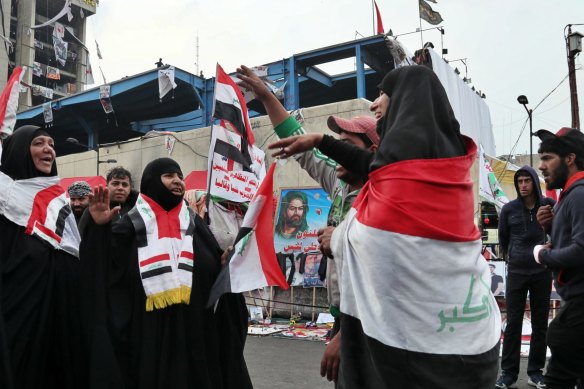 Demonstrators gather at Tahrir Square during ongoing anti-government protests in Baghdad on December 2.