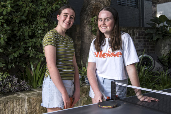 Teenage sisters Harper and Coco play table tennis and go for runs together to ease lockdown stress. 