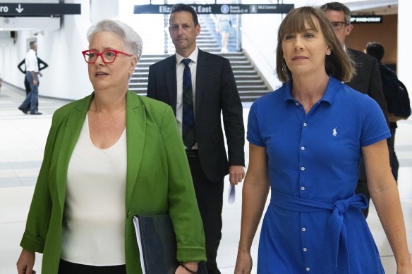 Acting Premier Penny Sharp (left) and Transport Minister Jo Haylen arrive at a press conference on Wednesday.