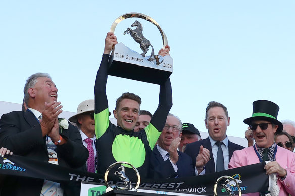 Sam Clipperton lifts the Everest trophy and is hoping there are more  to come in  2024.