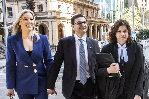 Surgeon Munjed Al Muderis, centre, outside the Federal Court in Sydney on Monday, and his barrister Sue Chrysanthou, SC, right.