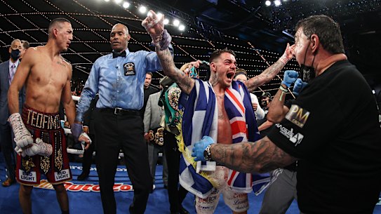 George Kambosos celebrates his win over Teofimo Lopez.