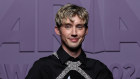 Troye Sivan poses with his awards at the 2024 ARIAs in Sydney, Australia. 
