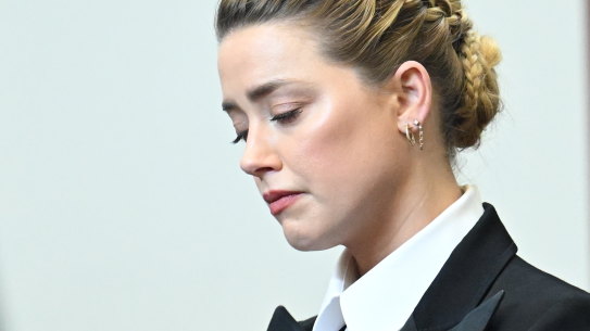 Actor Amber Heard listens in the courtroom as a psychiatrist says the actress had been sexually assualted. 
