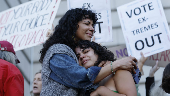 Mitzi Rivas, left, hugs her daughter Maya Iribarren during an abortion-rights protest at City Hall in San Francisco following the Supreme Court’s decision to overturn Roe v. Wade.