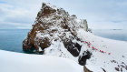 Hiking to Neptune’s Window, Deception Island, Antarctica.