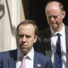 Britain's Health Secretary Matt Hancock (left) and Chief Medical Officer Chris Whitty outside 10 Downing Street on May 4.