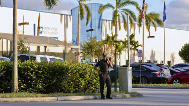 Police presence outside the US Post Office Royal Palm Processing and Distribution Centre in  in Opa-Locka, Florida.