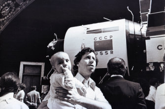 Rob Gowland attends a Moscow film festival with his son Evan, aged 12 months, in 1975.
