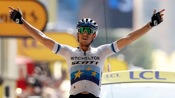 Italy's Matteo Trentin celebrates as he crosses the finish line to win stage 17.