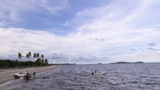 Residents fishing at Quintell Beach, Lockhart River.