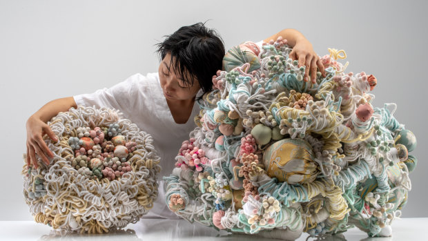 Artist Hiromi Tango pictured with her sculptures: 'Kimono's Will (Mother)', right and left,' Kimono's Will (Daughter)', both 2019.