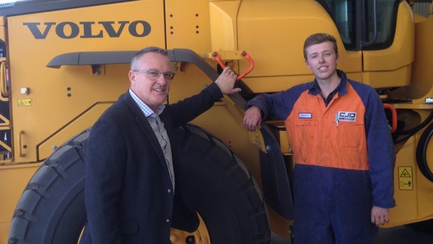 CJD Equipment general manager Michael Lombardo with first year apprentice Lachlan Biffin 