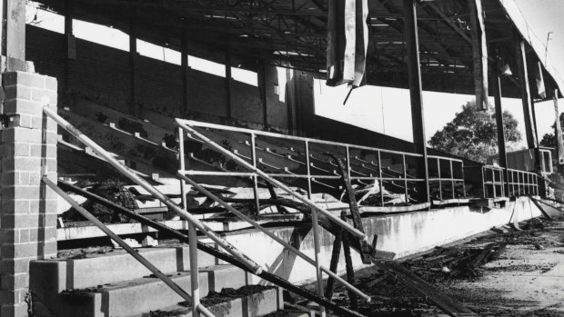 Fired up: Cumberland Oval, Parramatta's spiritual home, lies in smoking ruins after the Eels' final game there in 1981. 