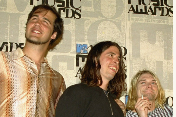 Nirvana band members Krist Novoselic, from left, Dave Grohl and Kurt Cobain pose after receiving the award for best alternative video for In Bloom at the 10th annual MTV Video Music Awards in 1993.