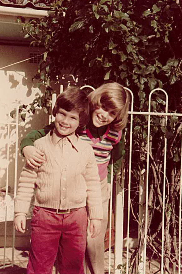 With his “very smart” sister Ronni, who died at age 40; a loss he describes as “so crazy overwhelming I just can’t unpack it”.