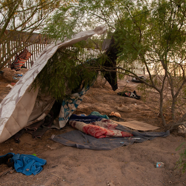 One day before Title 42 is set to be lifted, makeshift shelter and items are left behind by migrants along the US side of the wall in El Paso, Texas. 