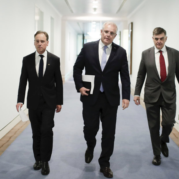 Health Minister Greg Hunt, Prime Minister Scott Morrison and Chief Medical Officer Professor Brendan Murphy in early March.