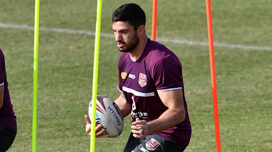 David Fifita (left) and Matt Gillett (right) are seen during Queensland State of Origin training at Langlands Park in Brisbane, Tuesday, July 2, 2019. Queensland are preparing for the 3rd State of Origin against New South Wales to be played in Sydney on Wednesday, July 10. (AAP Image/Darren England) NO ARCHIVING