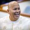 Ronald Dela Rosa nursing wounds to his fingers but all smiles in the chamber on Tuesday after his narrow escape.
